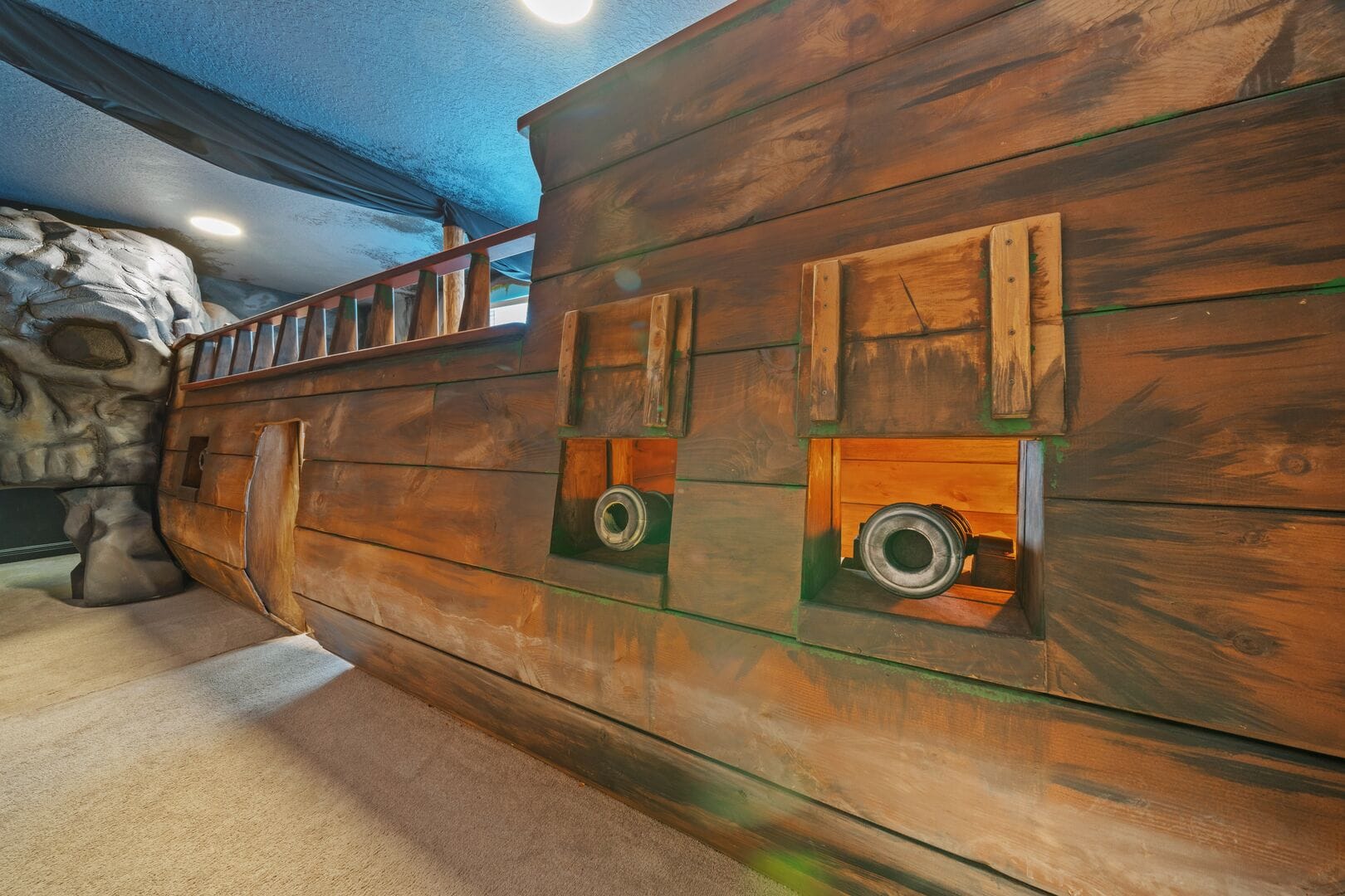 Indoor pirate ship play structure.