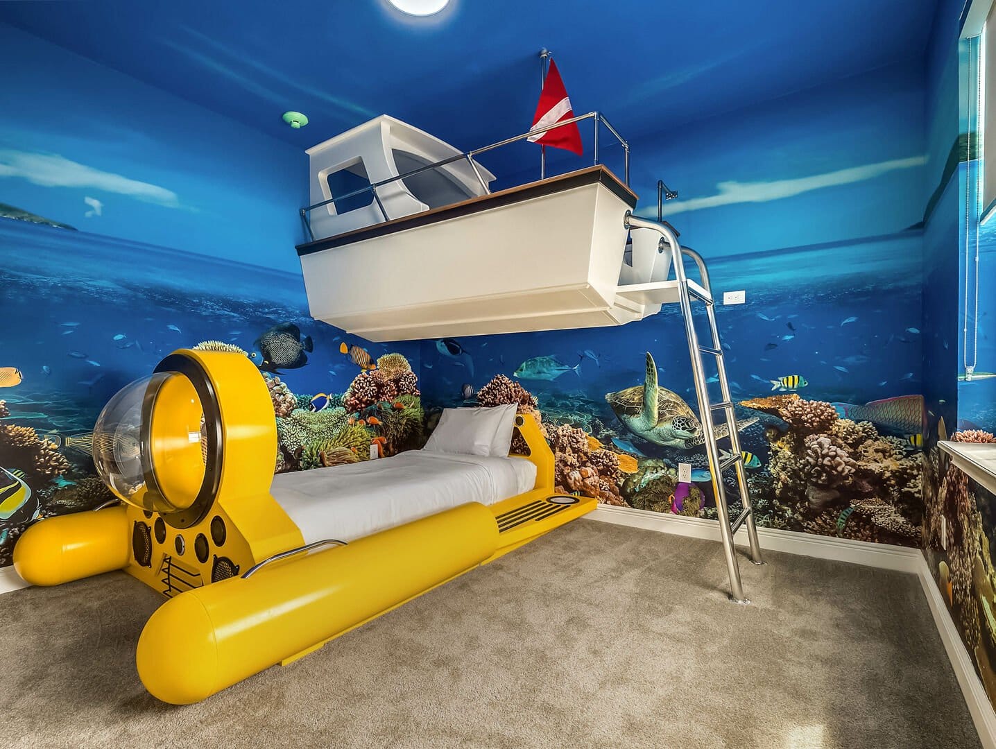 Ocean-themed kids’ bedroom with bunk.