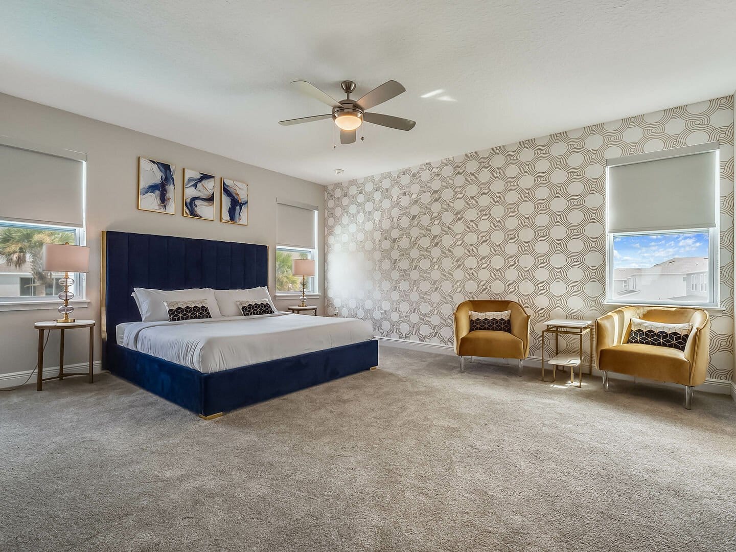 Modern bedroom with navy bed.