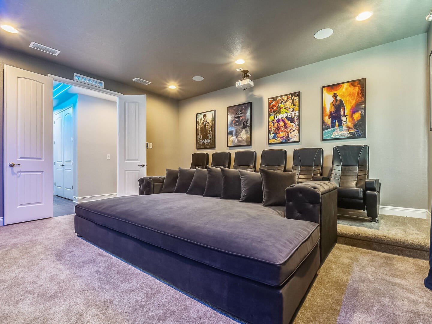 Home theater room with recliners.