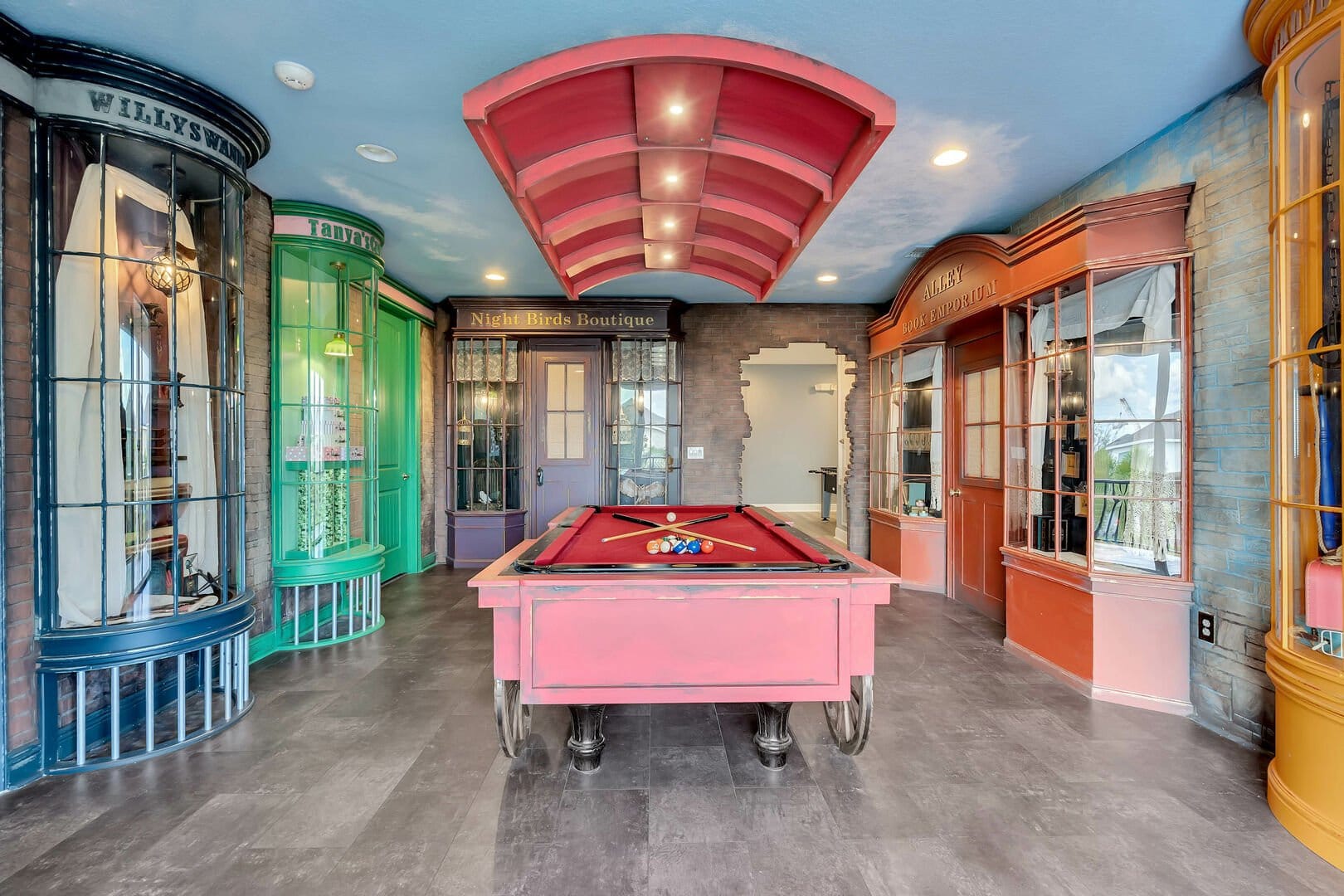 Colorful room with pool table.