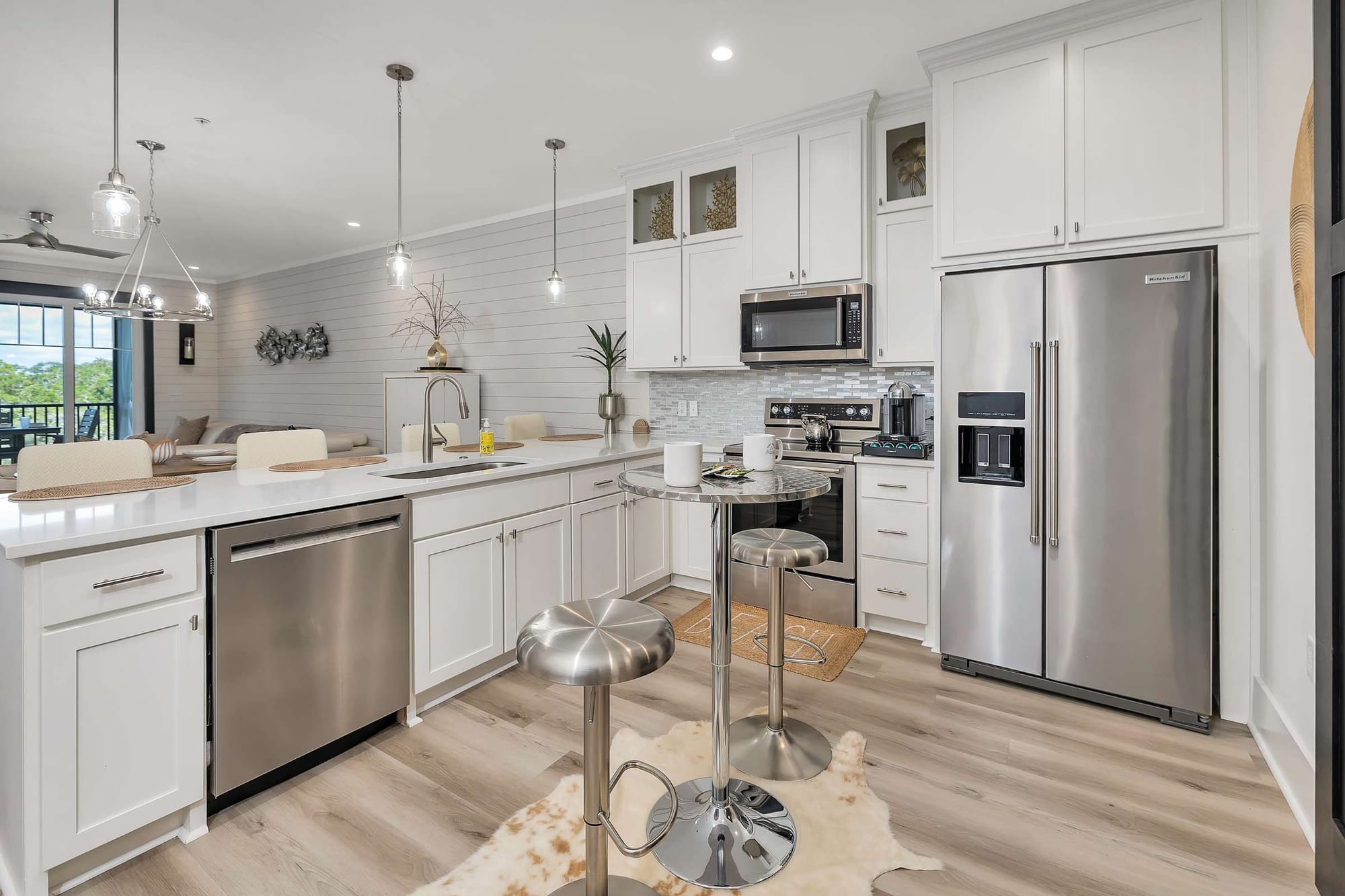 Modern kitchen with bar stools.