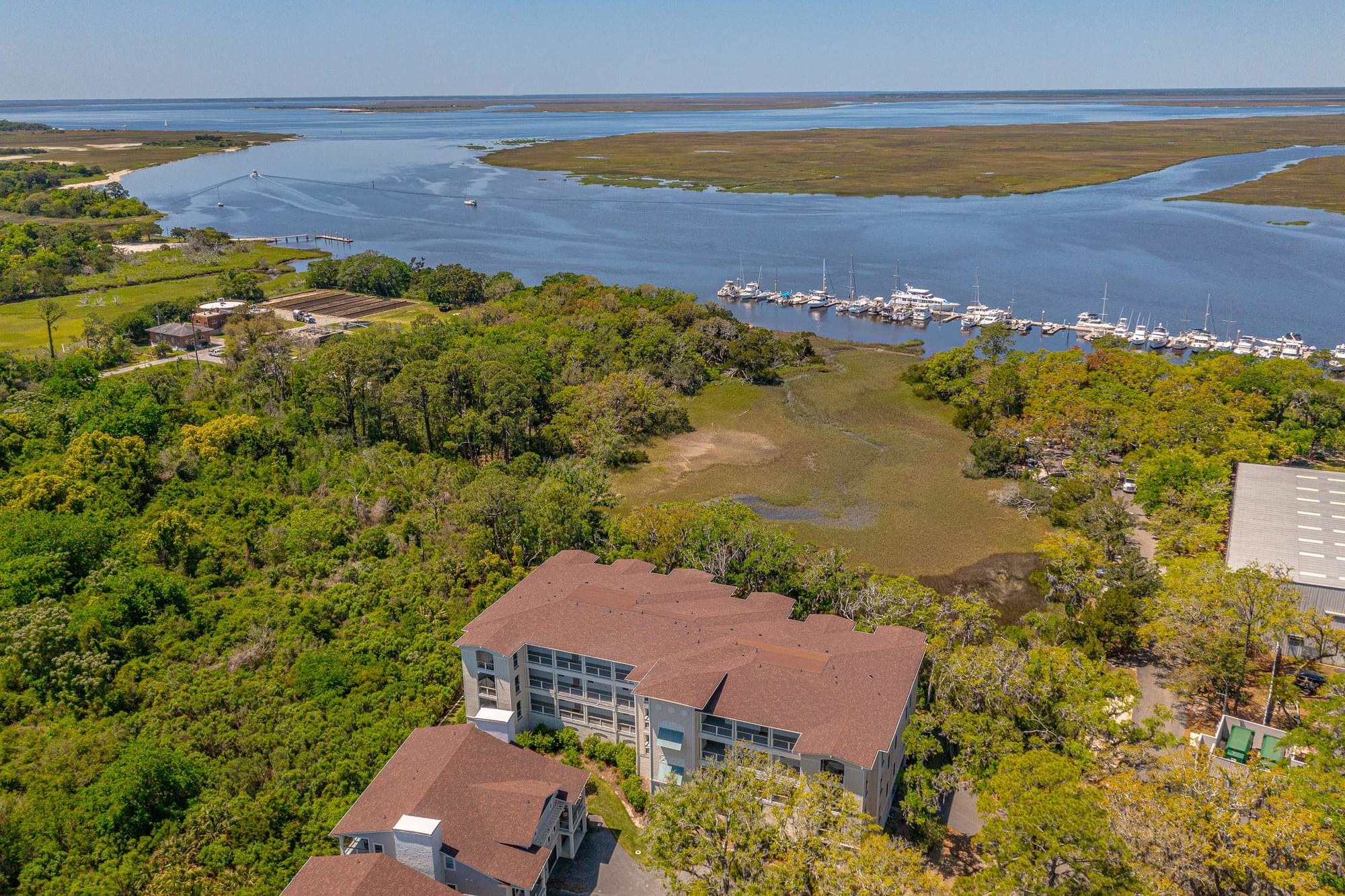 Riverside buildings and marina aerial view.