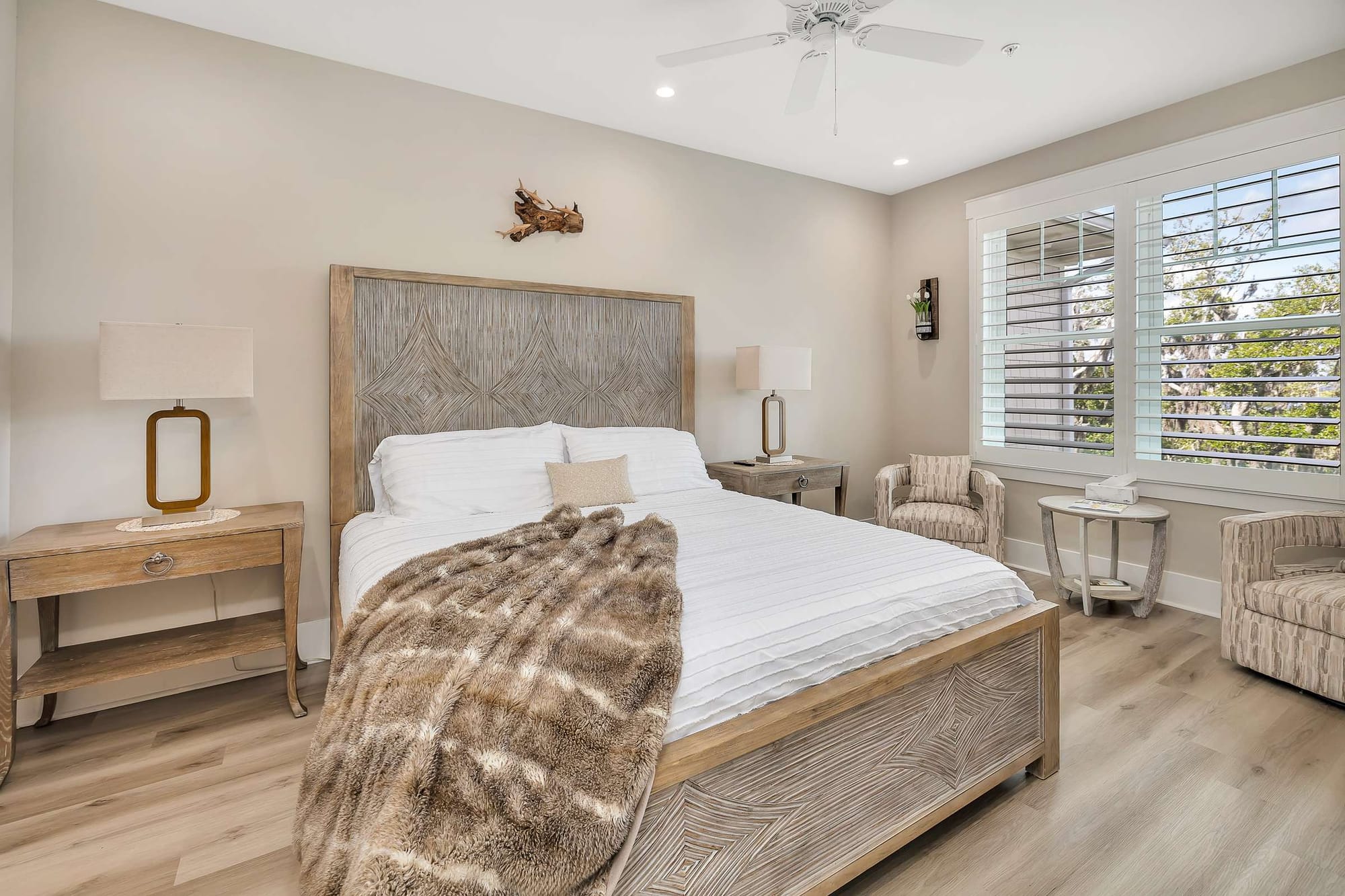 Elegant bedroom with wooden furniture.