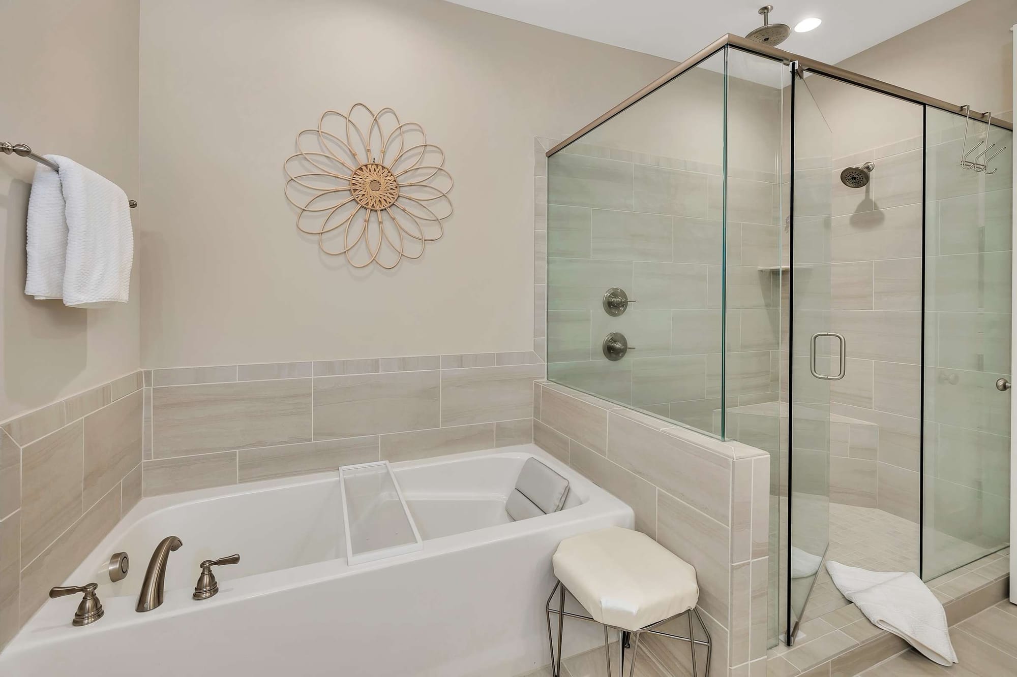 Modern bathroom with tub and shower.