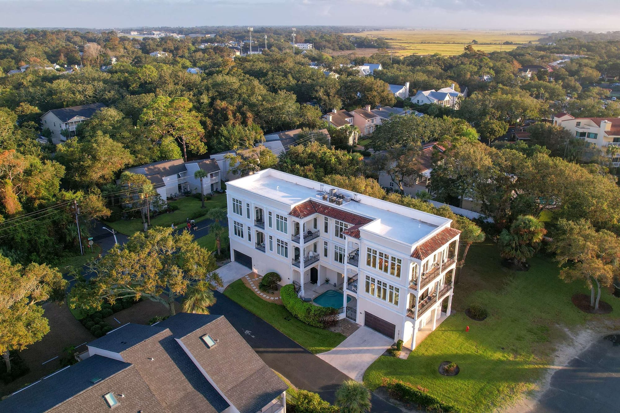 Aerial view of large white building.