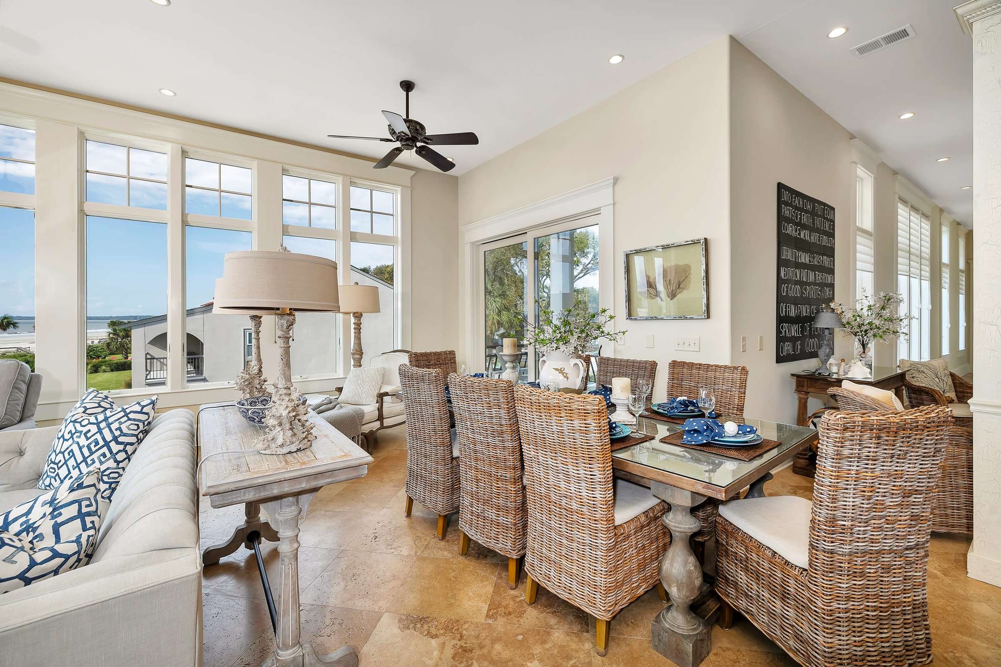 Bright coastal dining and living area.