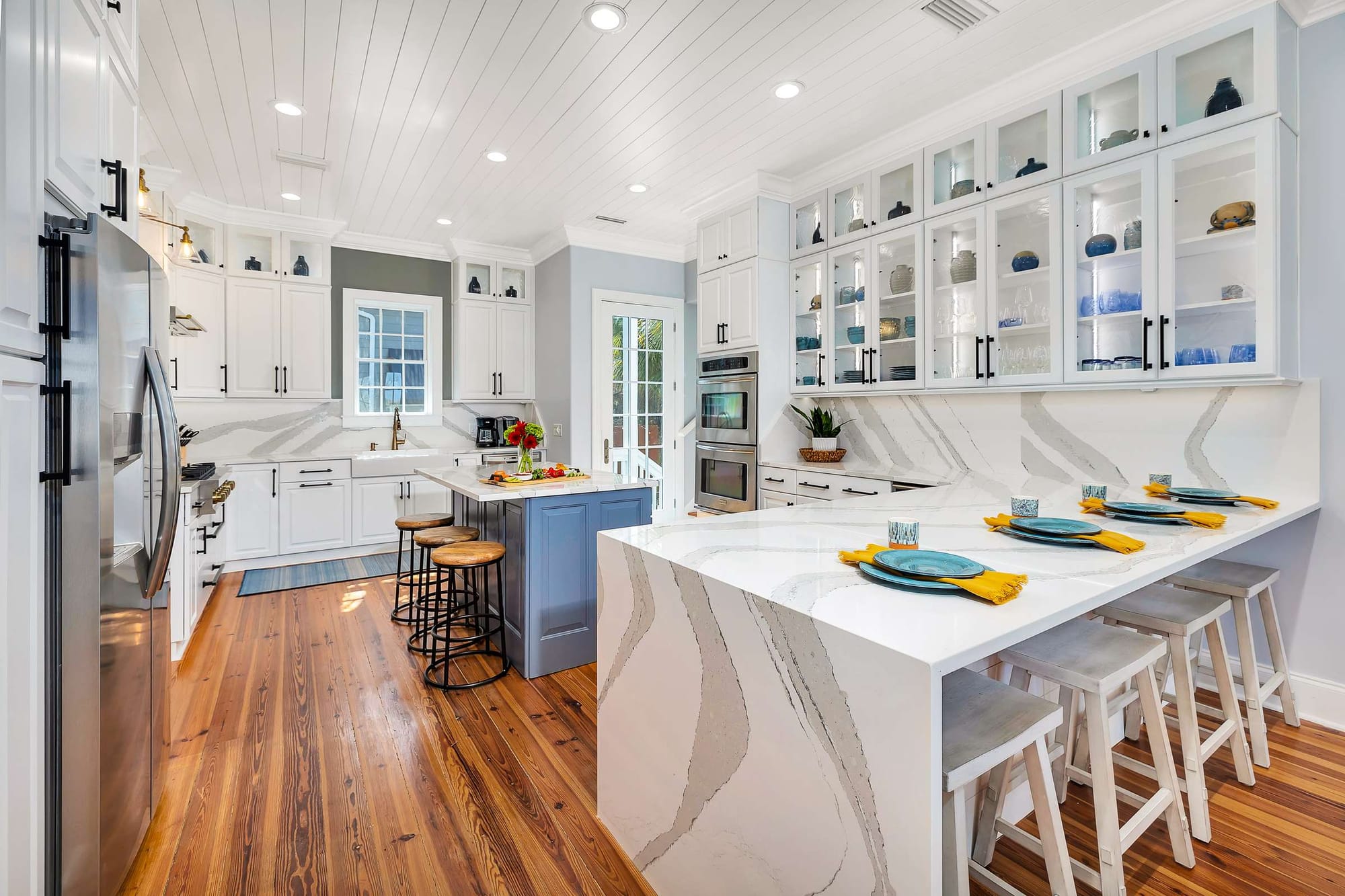 Modern white kitchen with island.