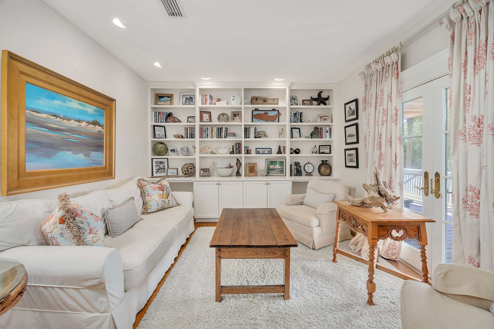 Cozy living room with bookshelves.