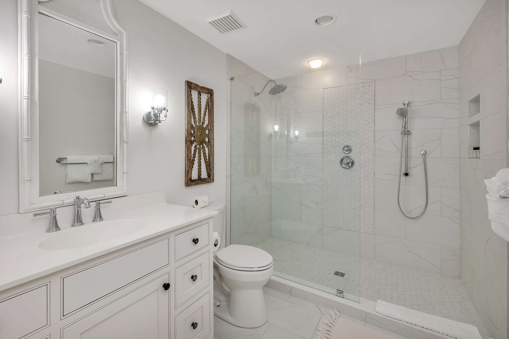 Modern white bathroom with shower.