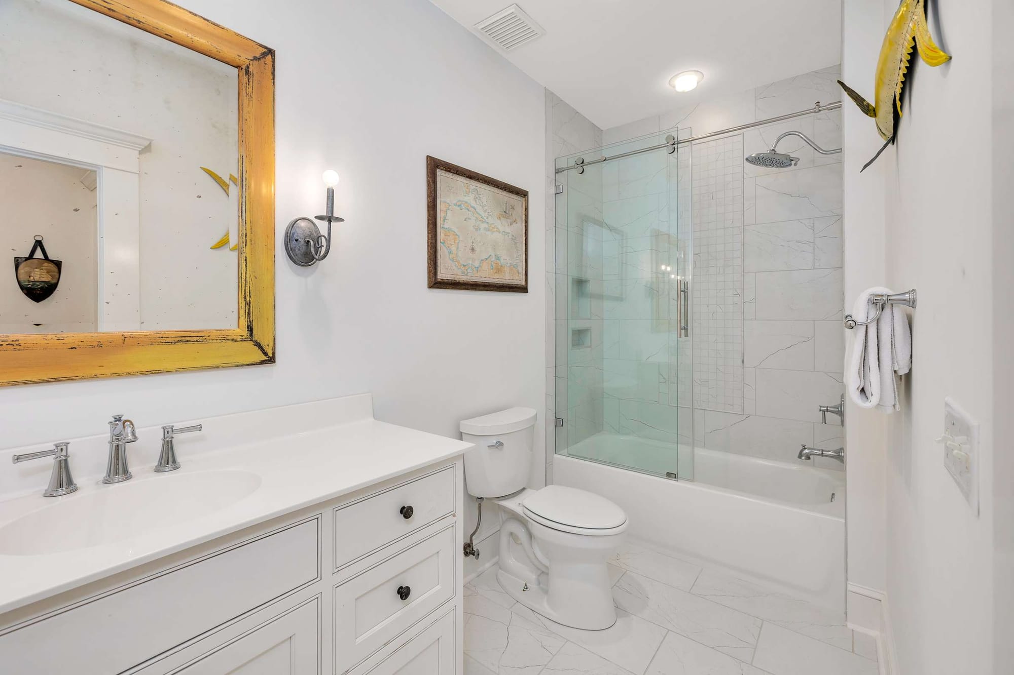 Modern bathroom with glass shower door.