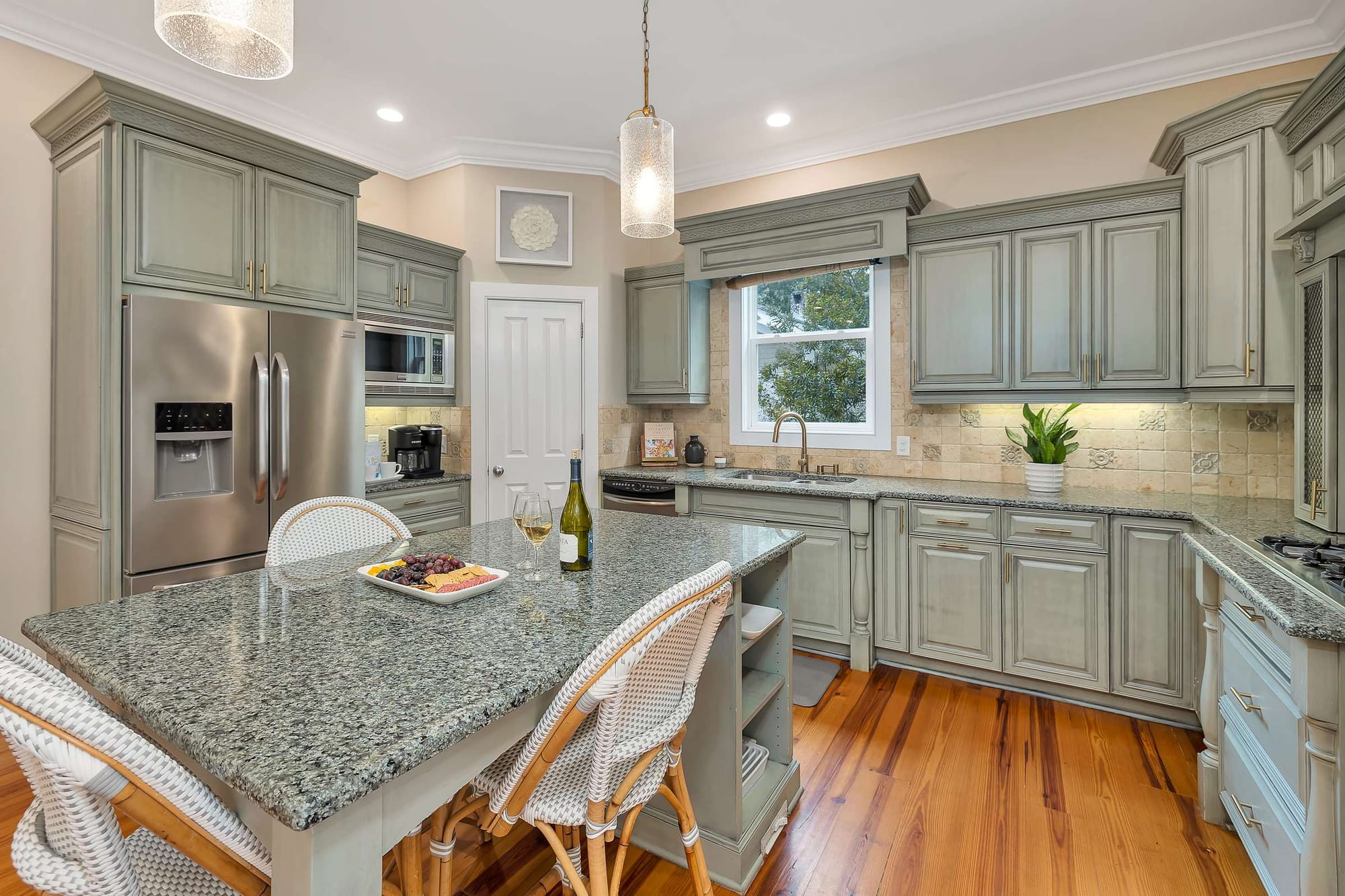 Modern kitchen with granite countertops.