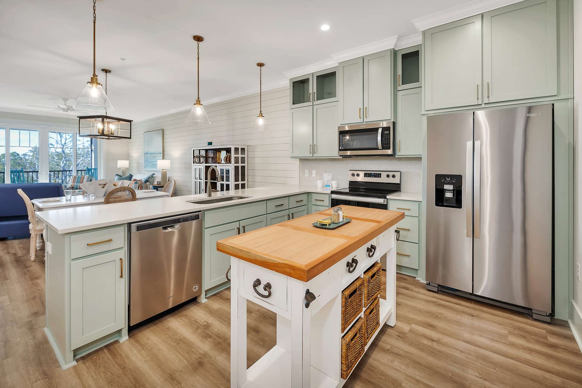 Modern kitchen with wooden island.