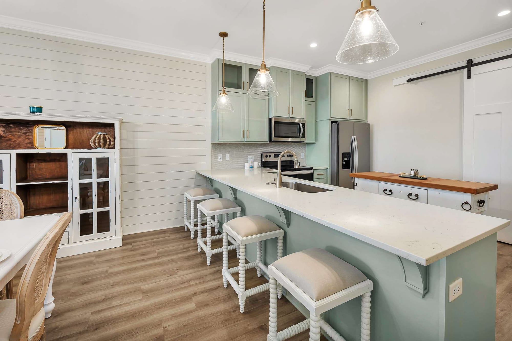 Modern kitchen with island seating.