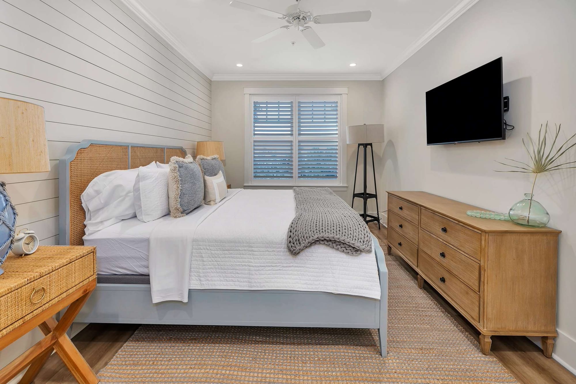 Modern bedroom with wooden furniture.