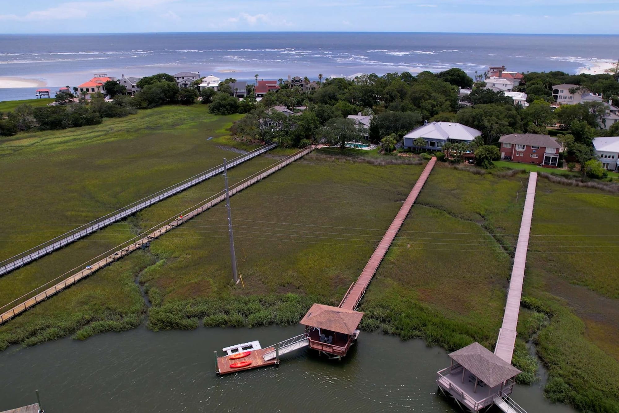 Houses with long docks, waterfront.