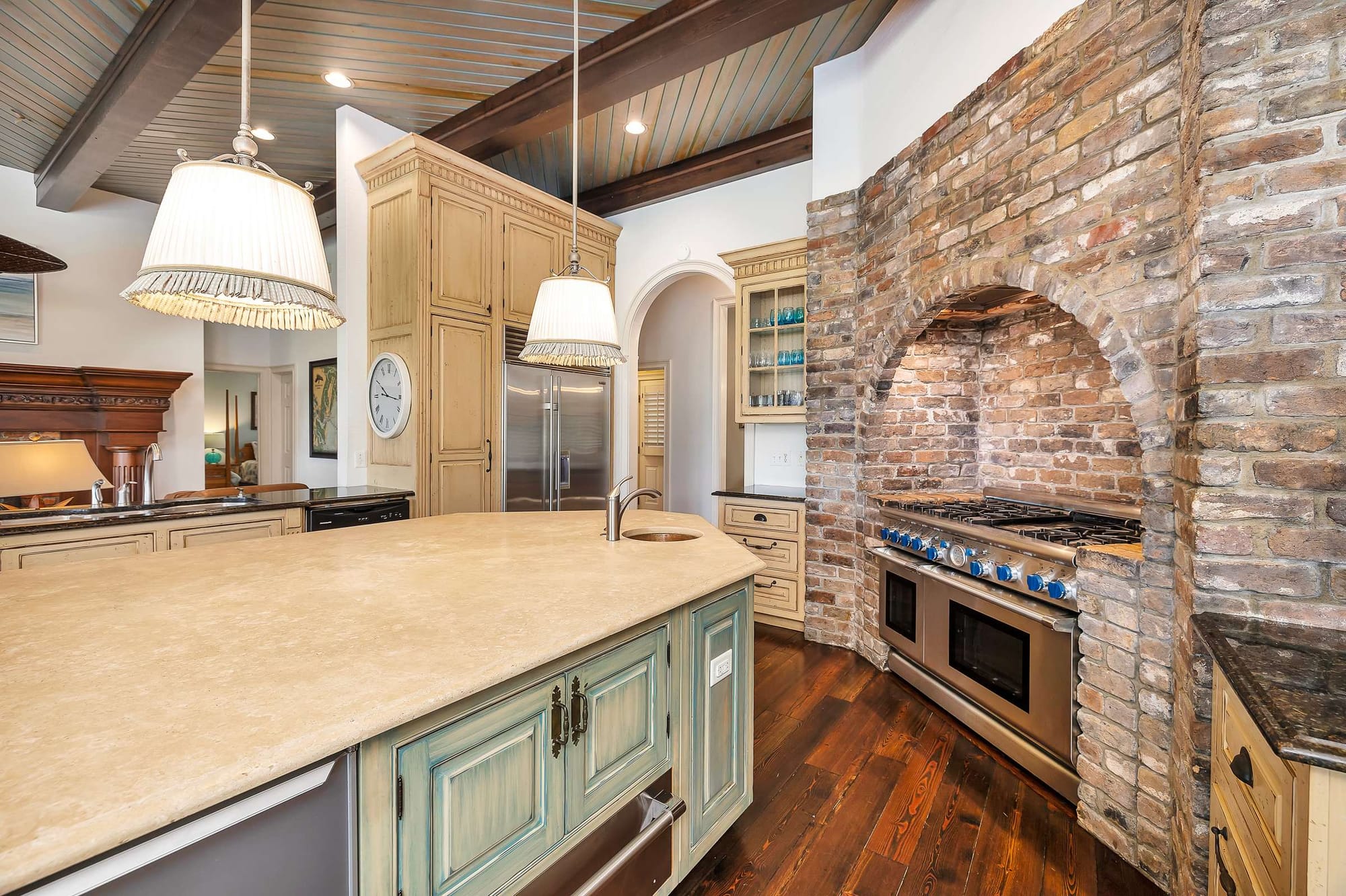 Rustic kitchen with brick accents.