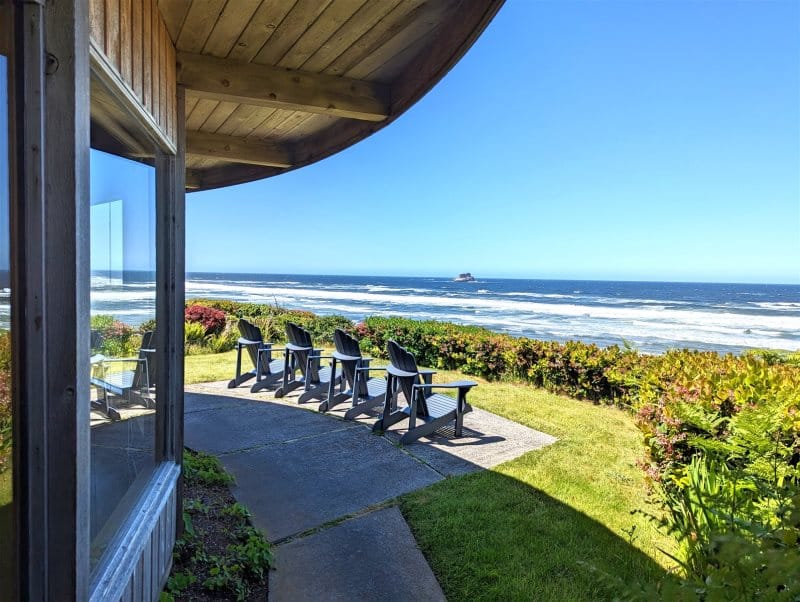 Patio chairs overlooking the ocean.