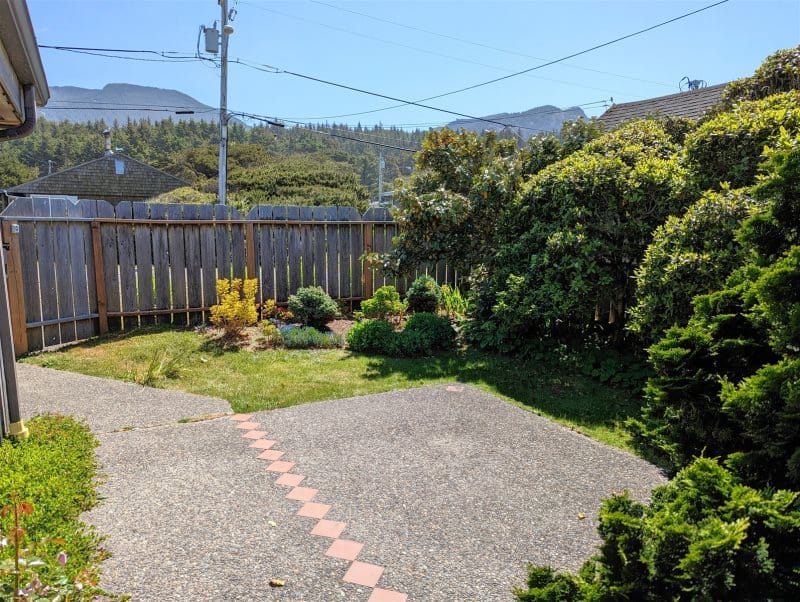 Sunny backyard with mountain view.