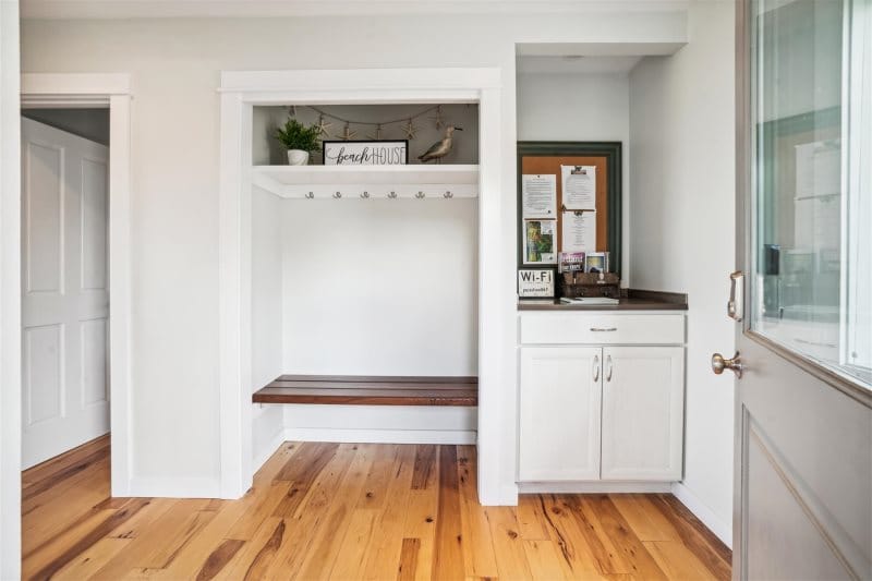 Cozy entryway with bench seat.