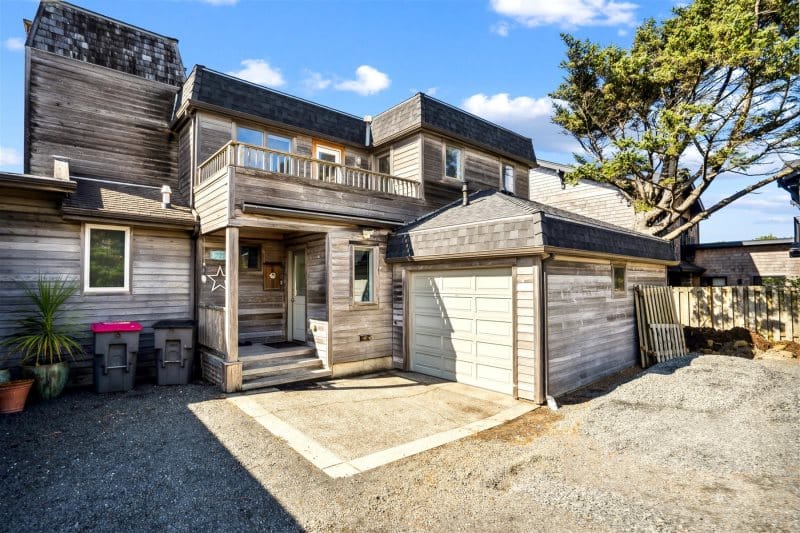 Modern wooden house with garage.