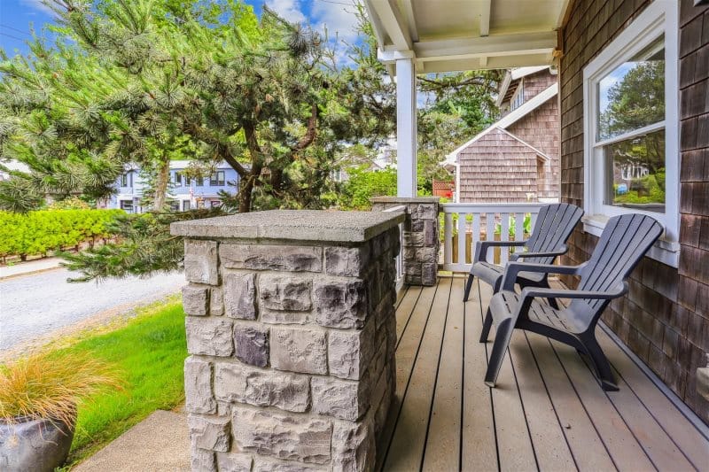 Cozy porch with two chairs.