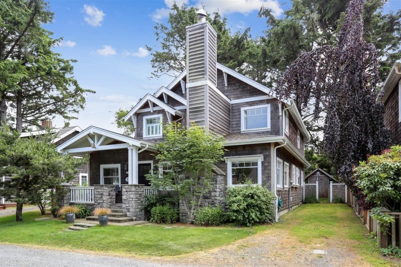 Two-story house with front porch.