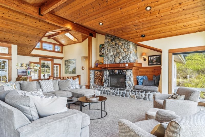 Cozy rustic living room with fireplace.