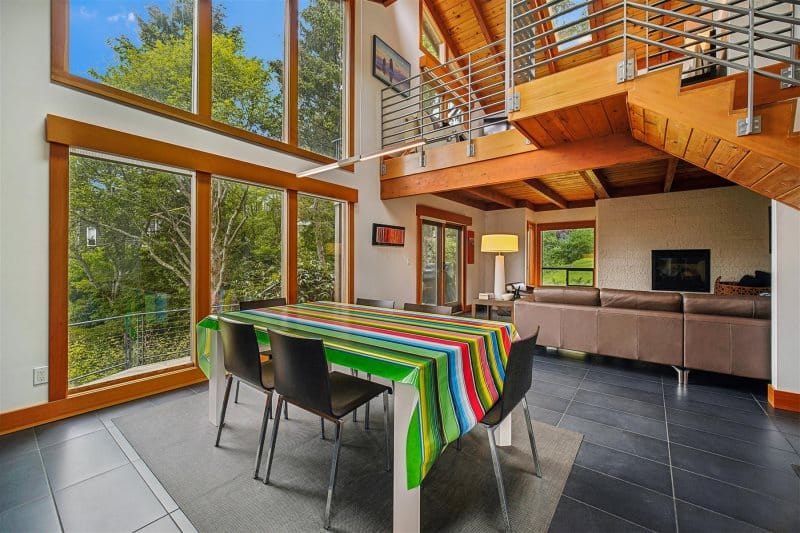 Modern living area with colorful table.