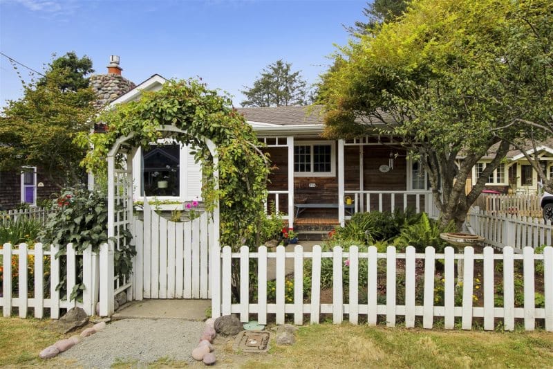 Charming house with white picket fence.