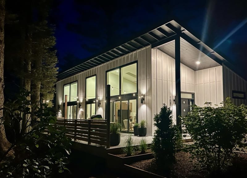 Modern house exterior at night.