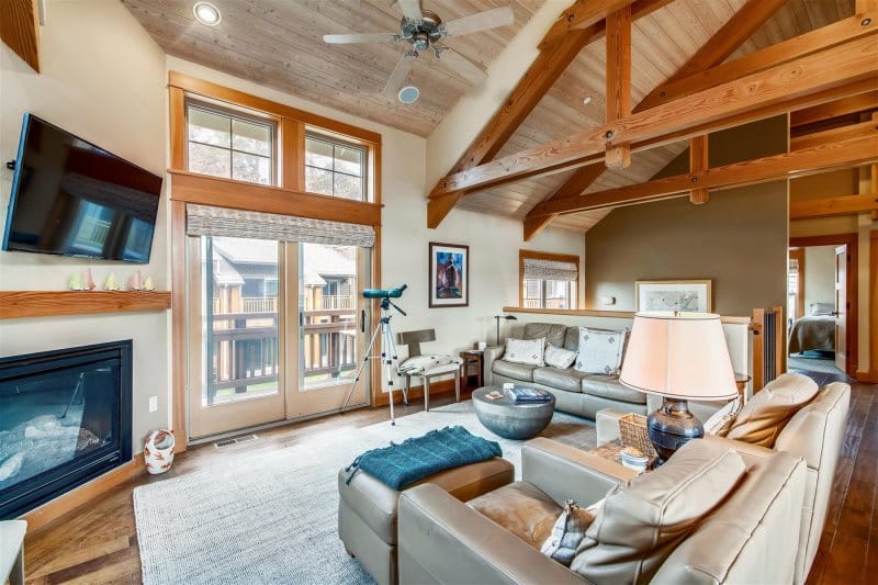 Living room with wooden ceiling beams.