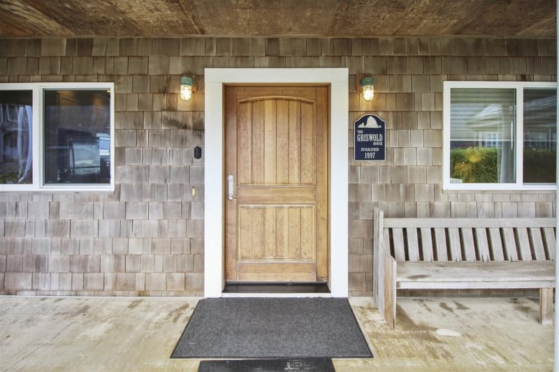 Wooden door with two windows.