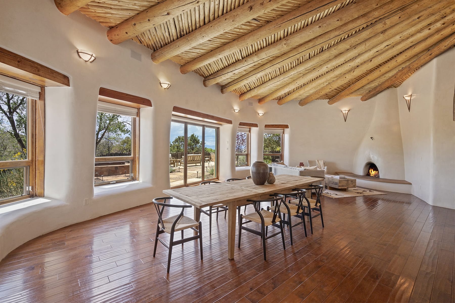 Rustic dining area with fireplace.