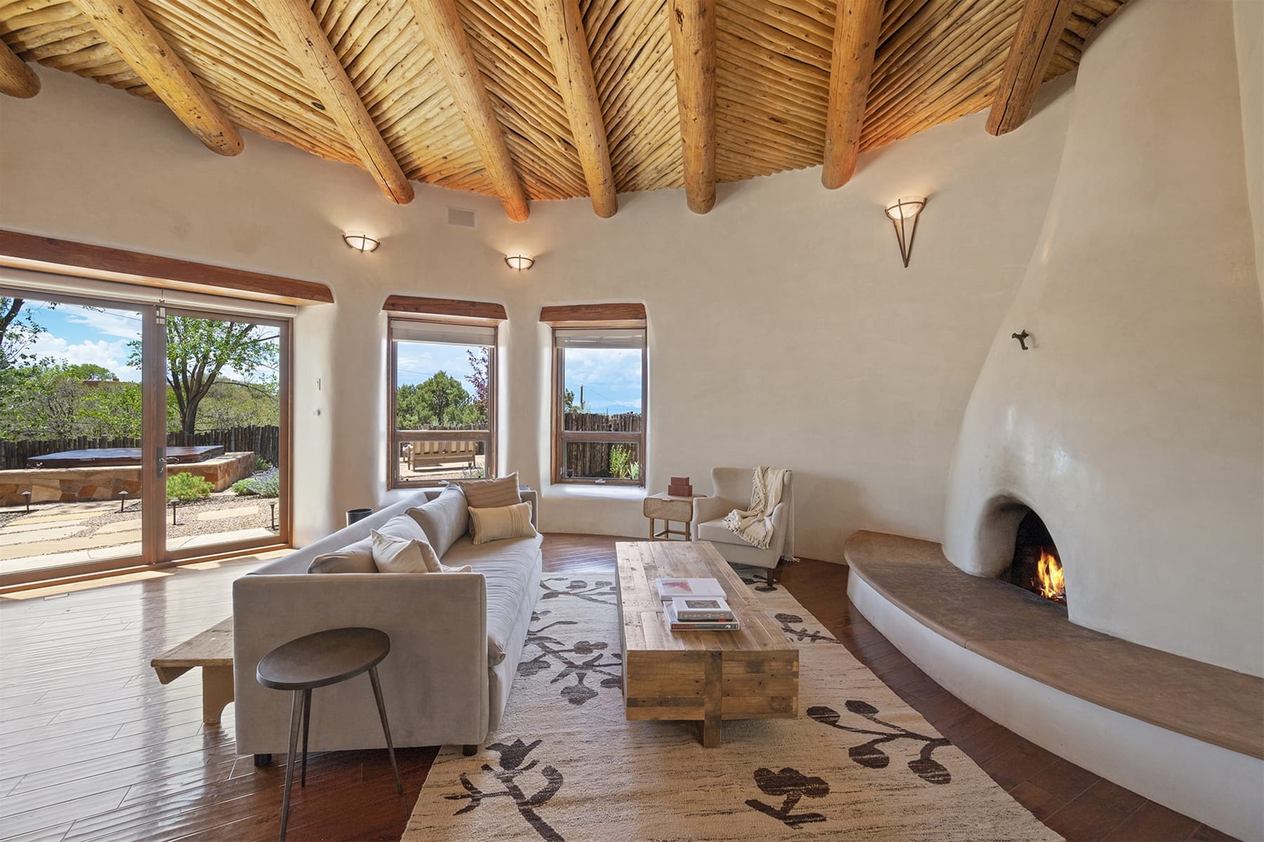 Bright room with wooden ceiling.