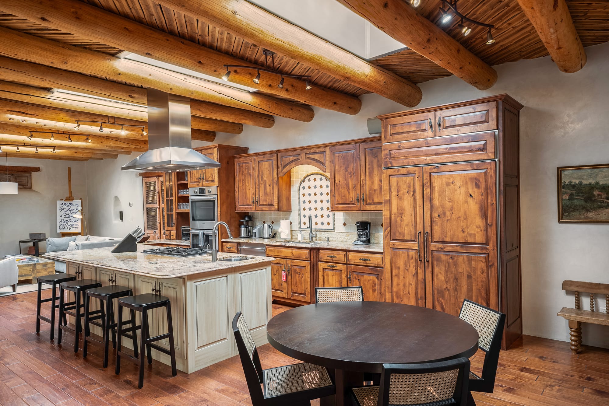 Rustic kitchen with wooden cabinets.