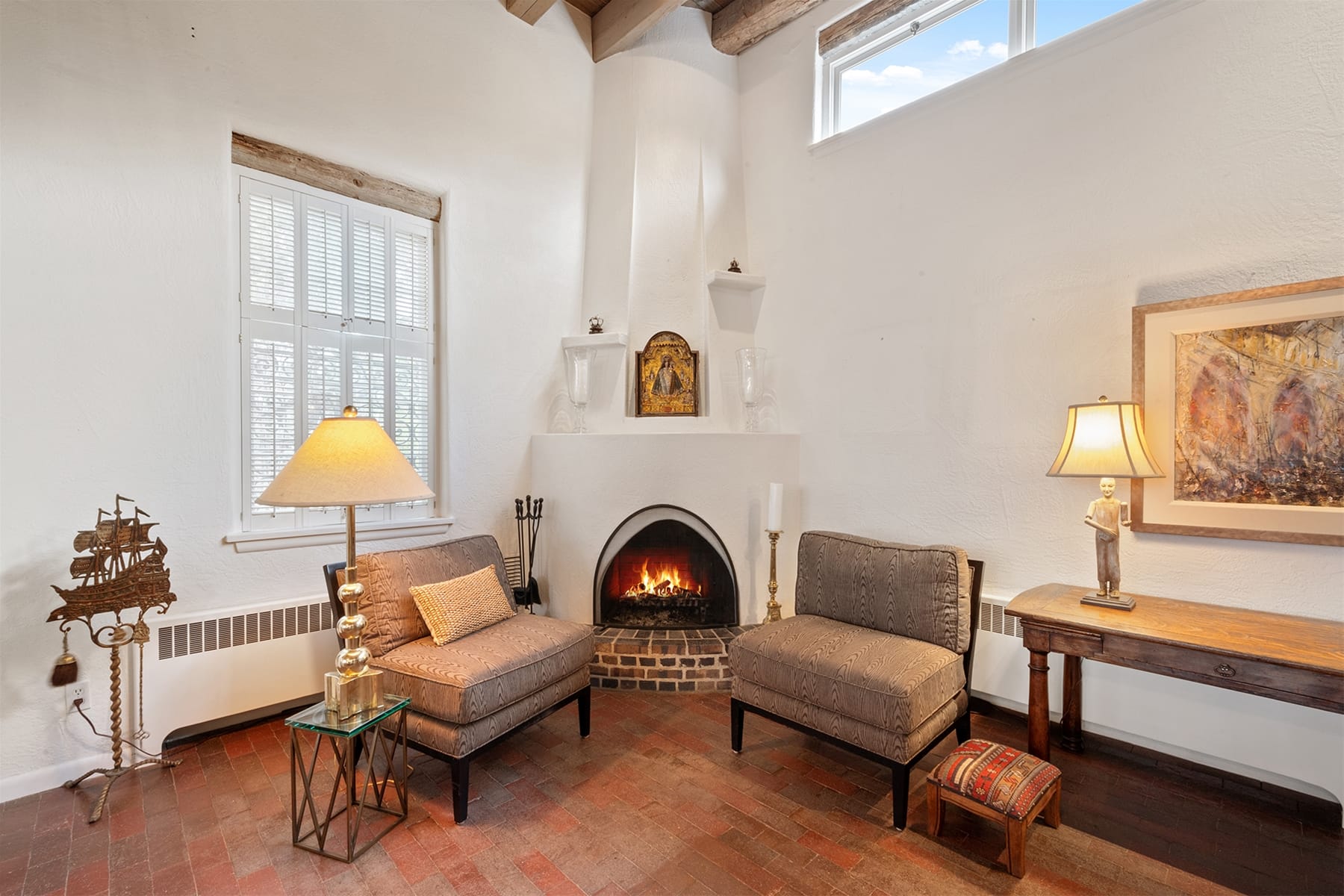 Cozy sitting area with fireplace.