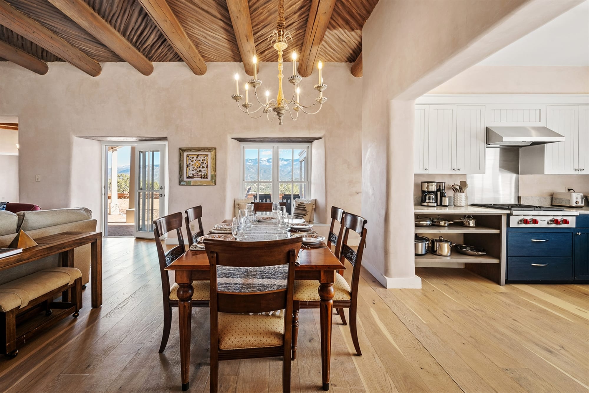 Open dining area with wooden ceiling.