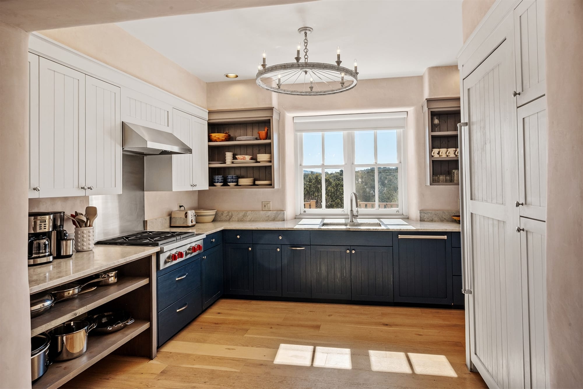 Modern kitchen with large window.