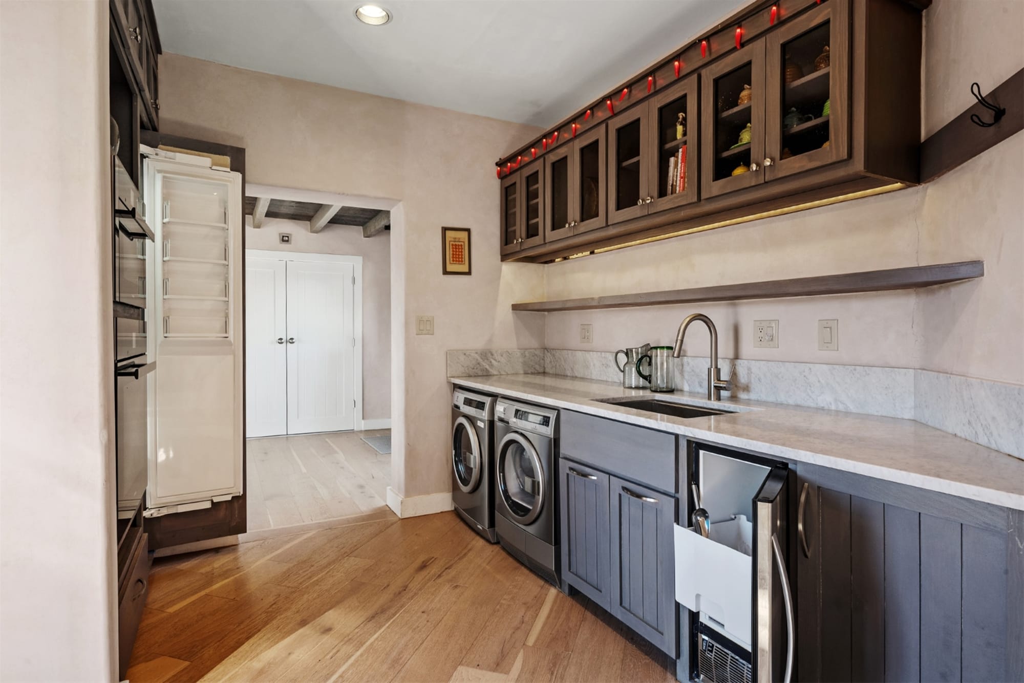 Modern laundry room with appliances.