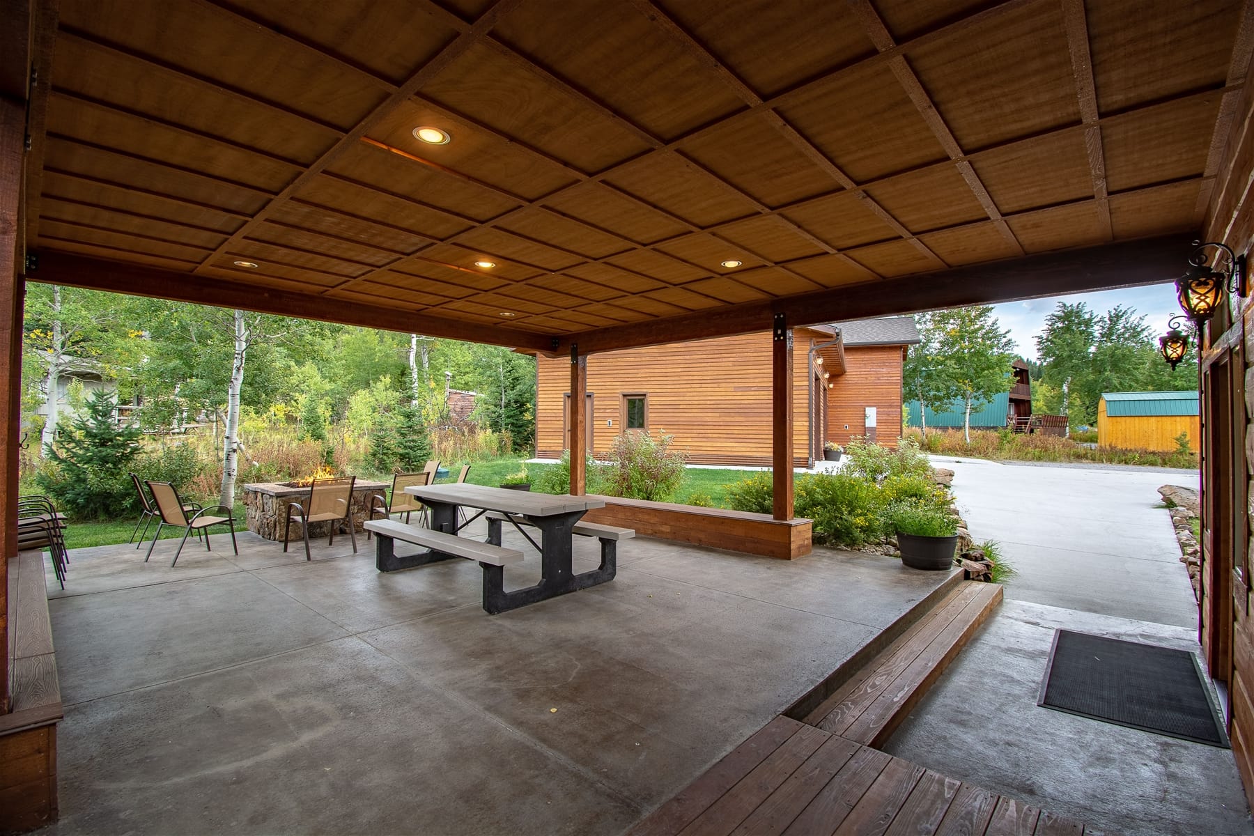 Covered patio with picnic table.