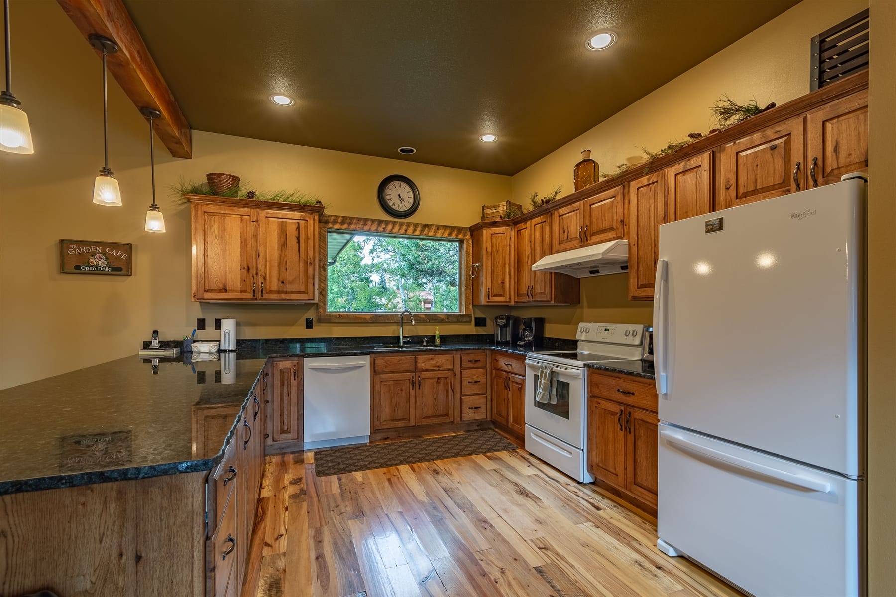 Rustic kitchen with wooden cabinets.