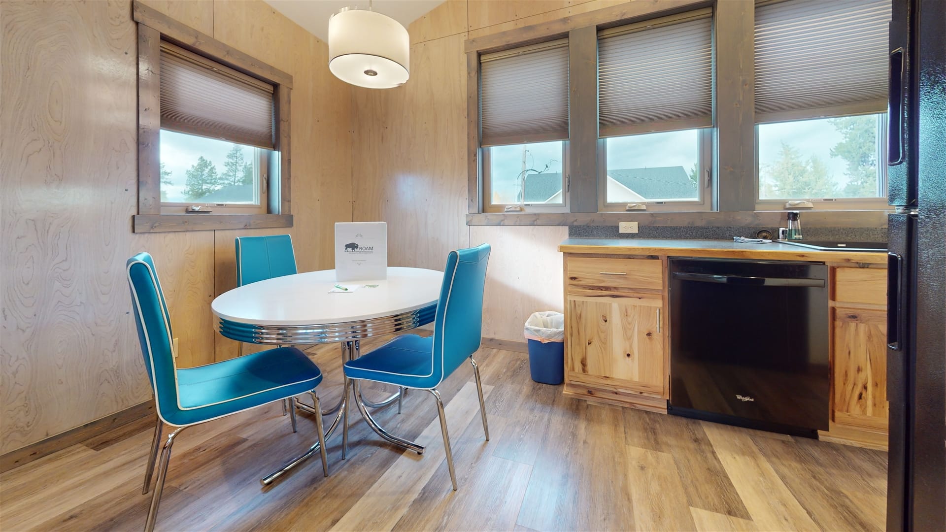 Modern kitchen with dining area.