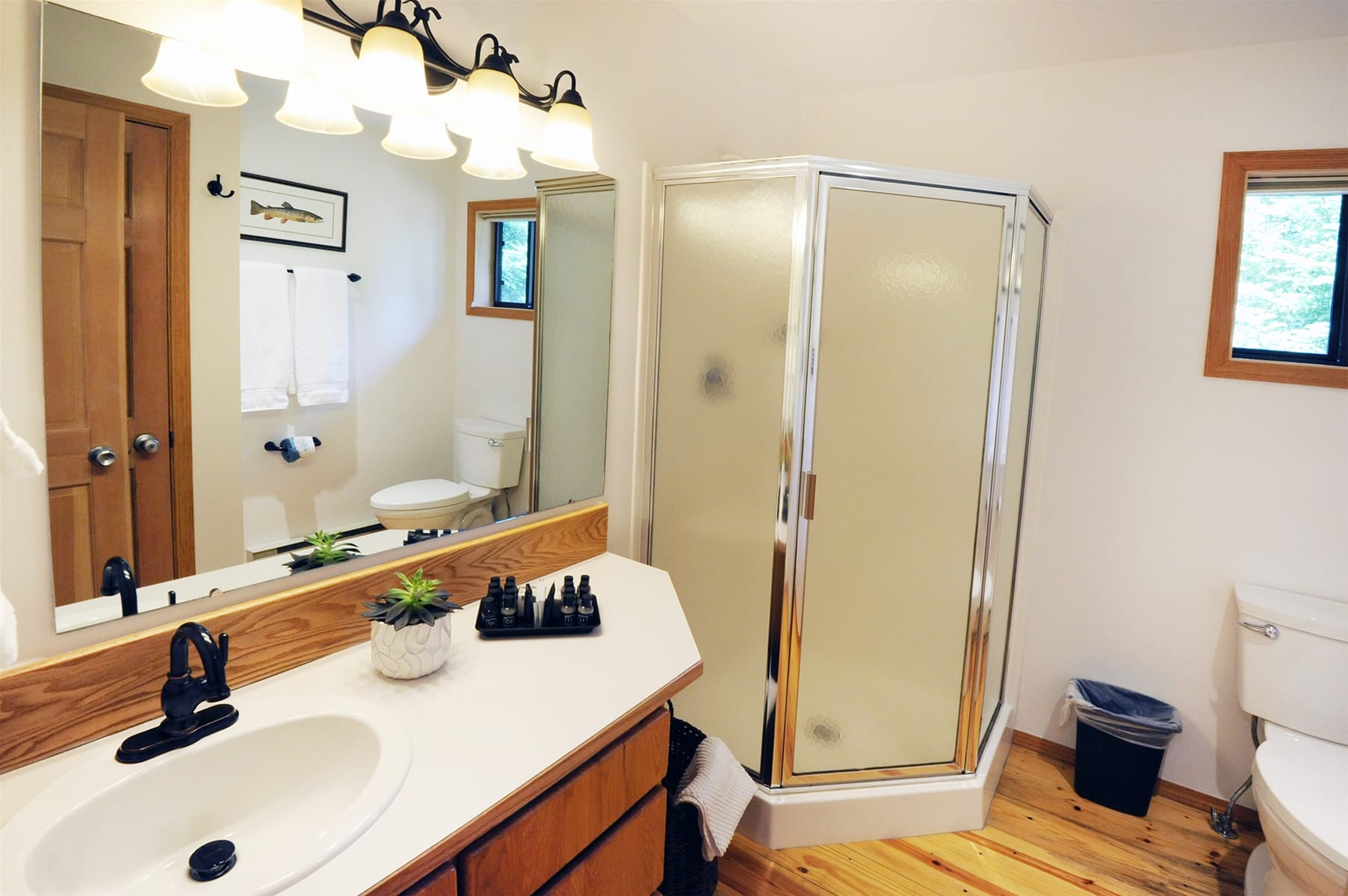 Bathroom with shower and sink.