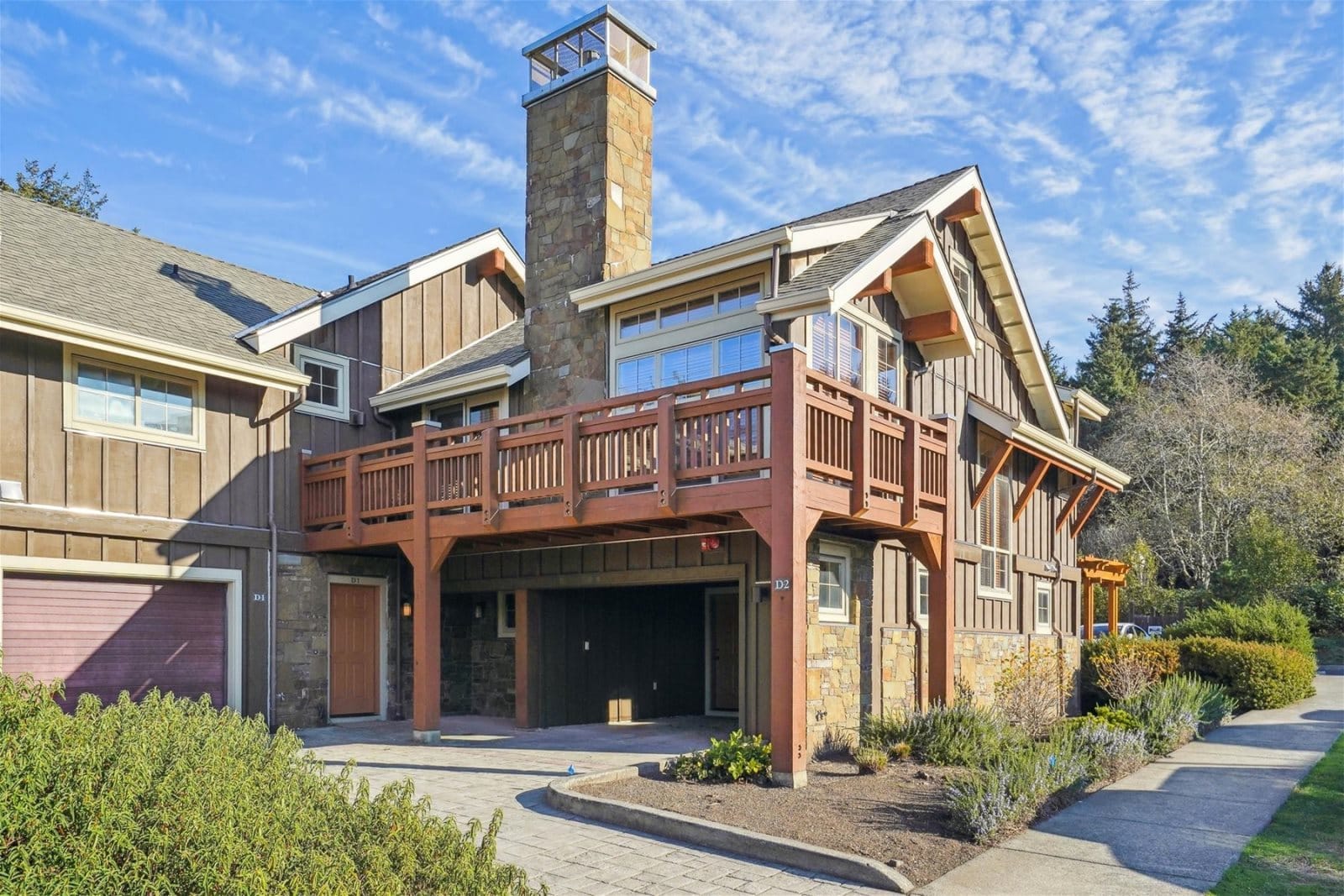 Wooden house with stone chimney.