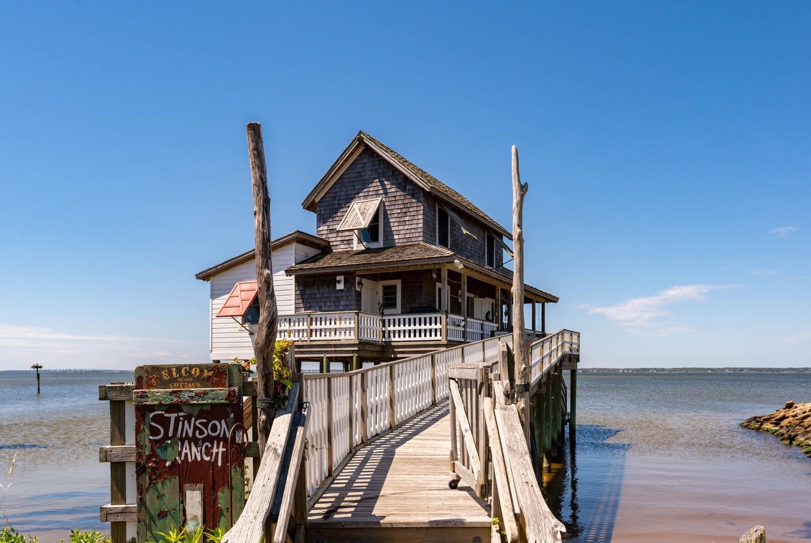 House on stilts, over water.