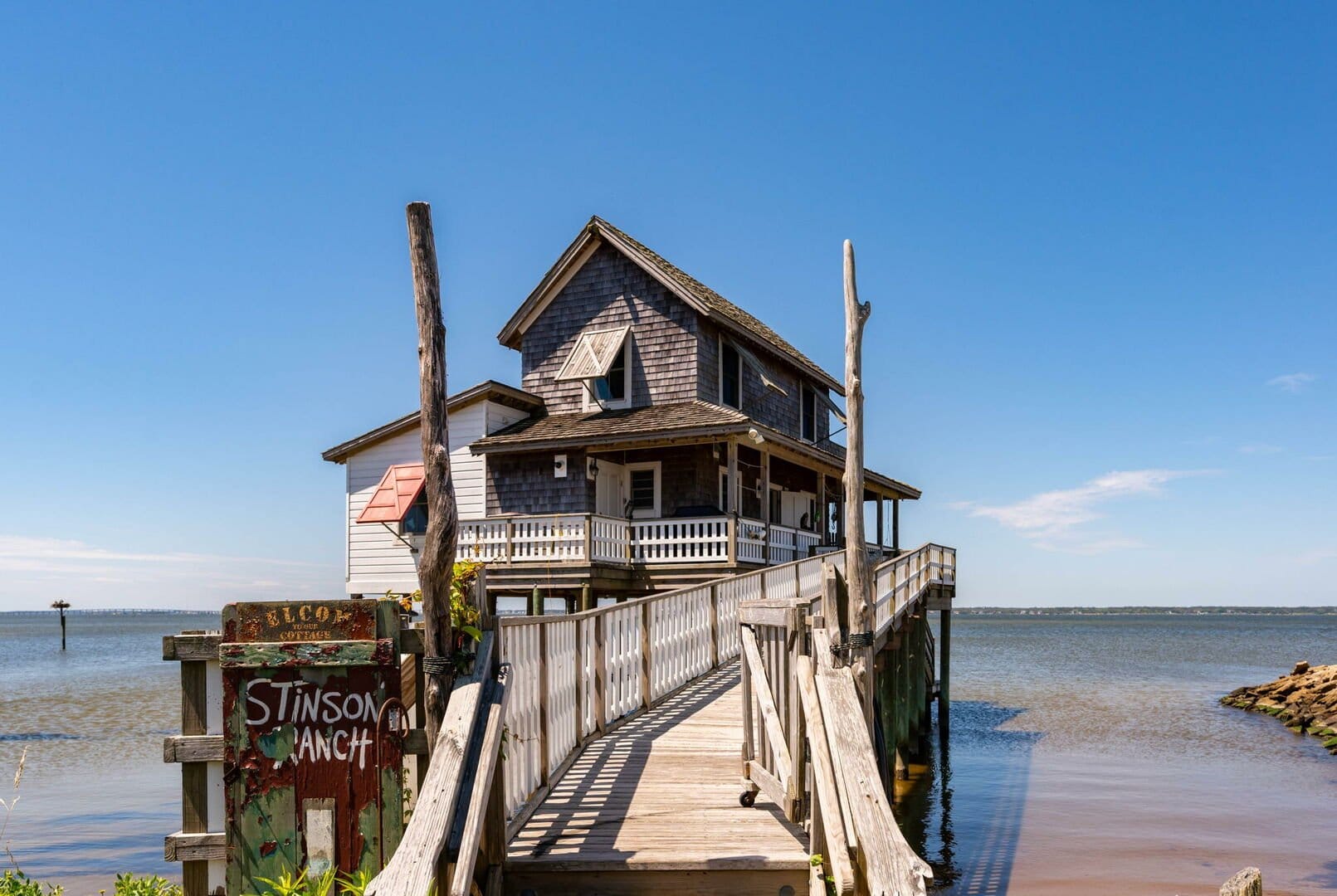 Rustic house on waterfront pier.