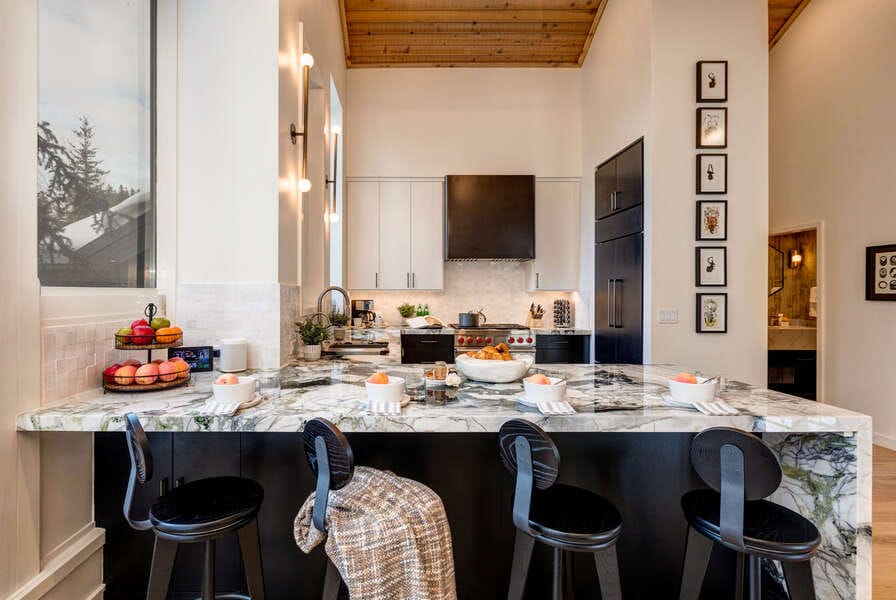 Modern kitchen with marble island.