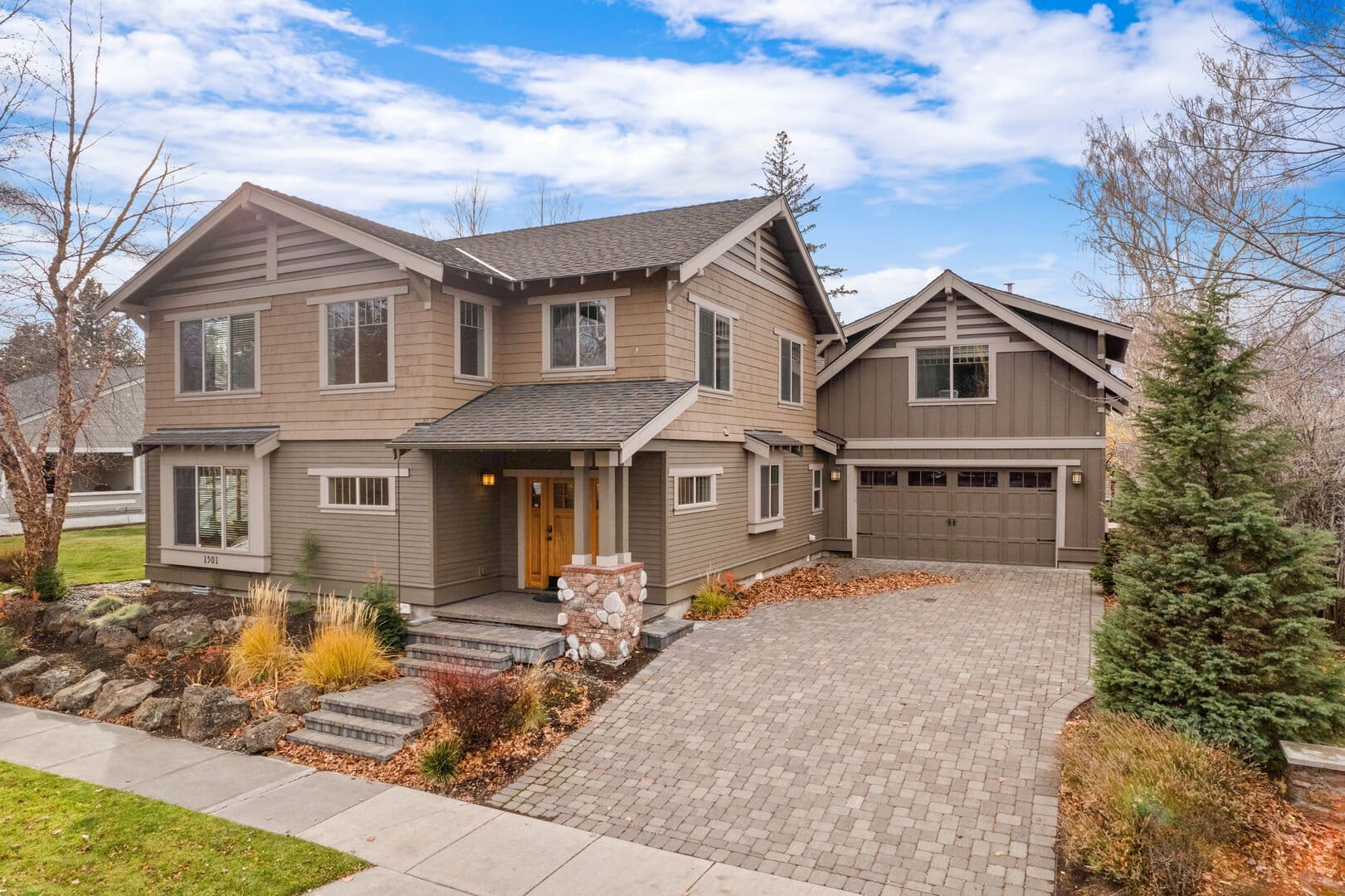 Two-story house with double garage.