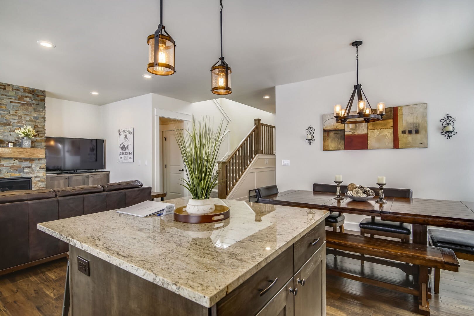 Modern open-concept dining and living area.